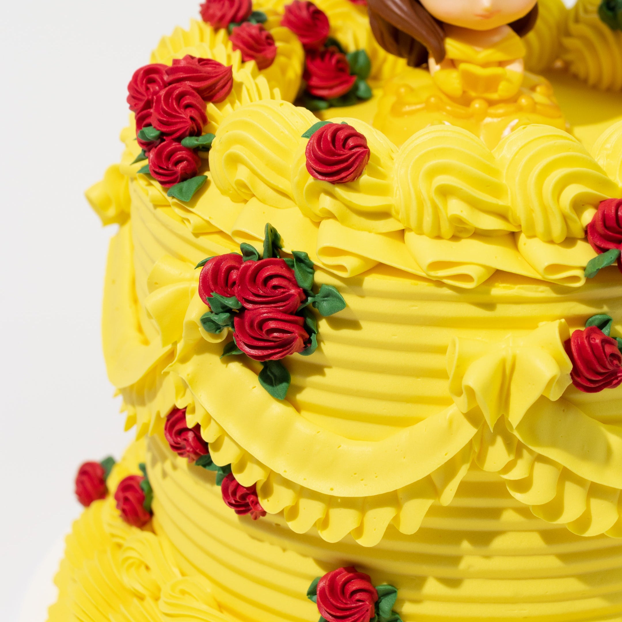 Luxury Disney Princess Belle-inspired vintage cake. Belle figurine topper. Beauty and the Beast theme.